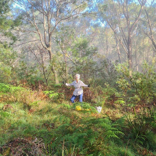 woman posing in bushland setting