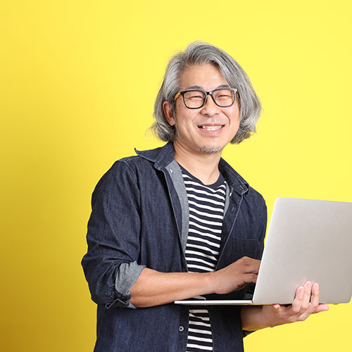 Korean man with laptop