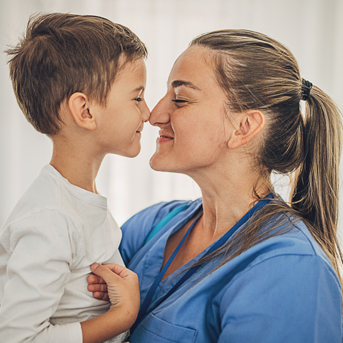 key worker at home with her son